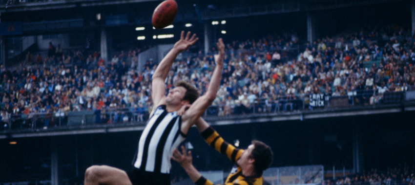 Phil Carman flies for a mark against Hawthorn in the 1970s.