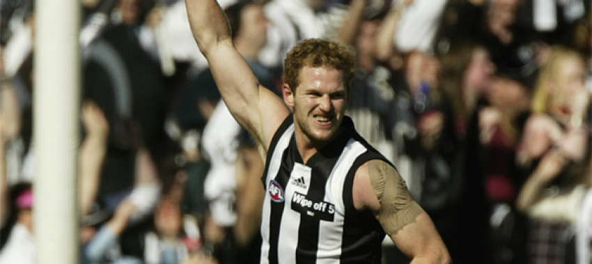 Ben Johnson celebrates a first quarter goal against Port Adelaide as the Magpies romped to a 44-point win in the 2003 Preliminary Final.