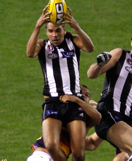 Andrew Krakouer flies for a mark in the round nine match against Adelaide in 2011.