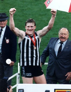 Nathan Buckley celebrates winning the Jack Oatey Medal.